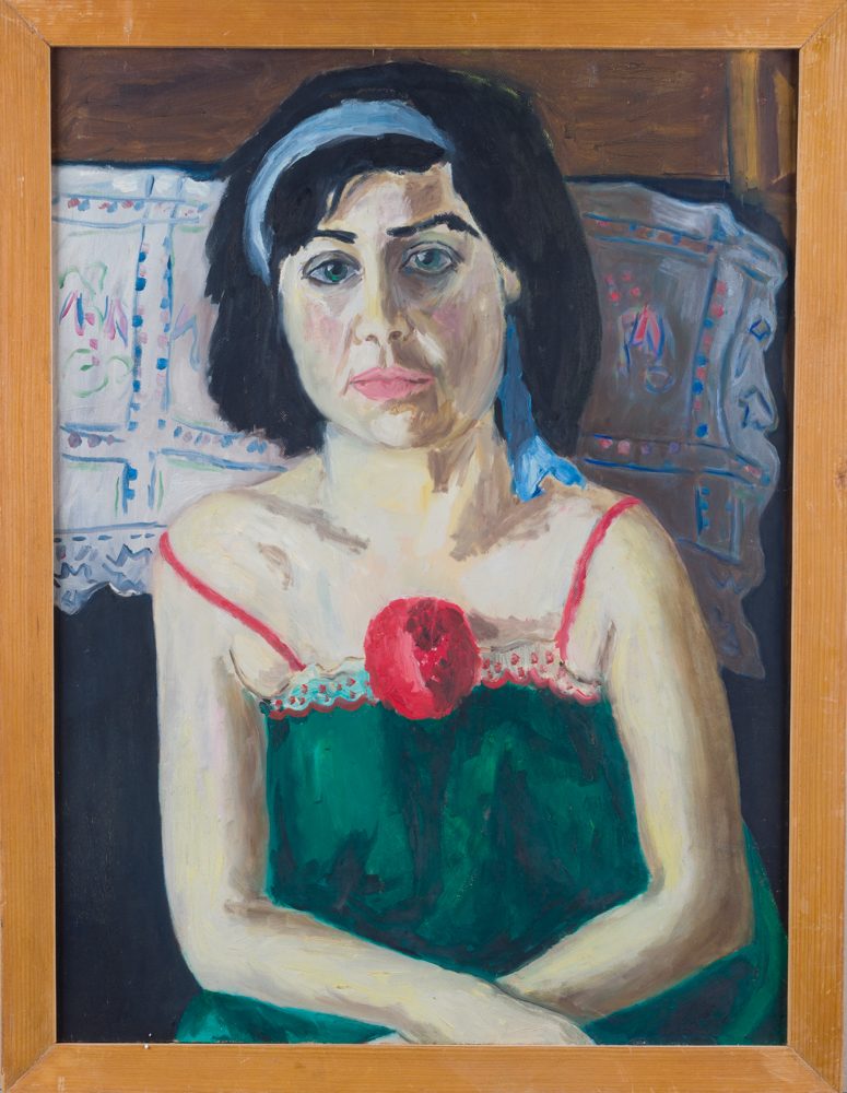 Jeune femme au pompon rouge